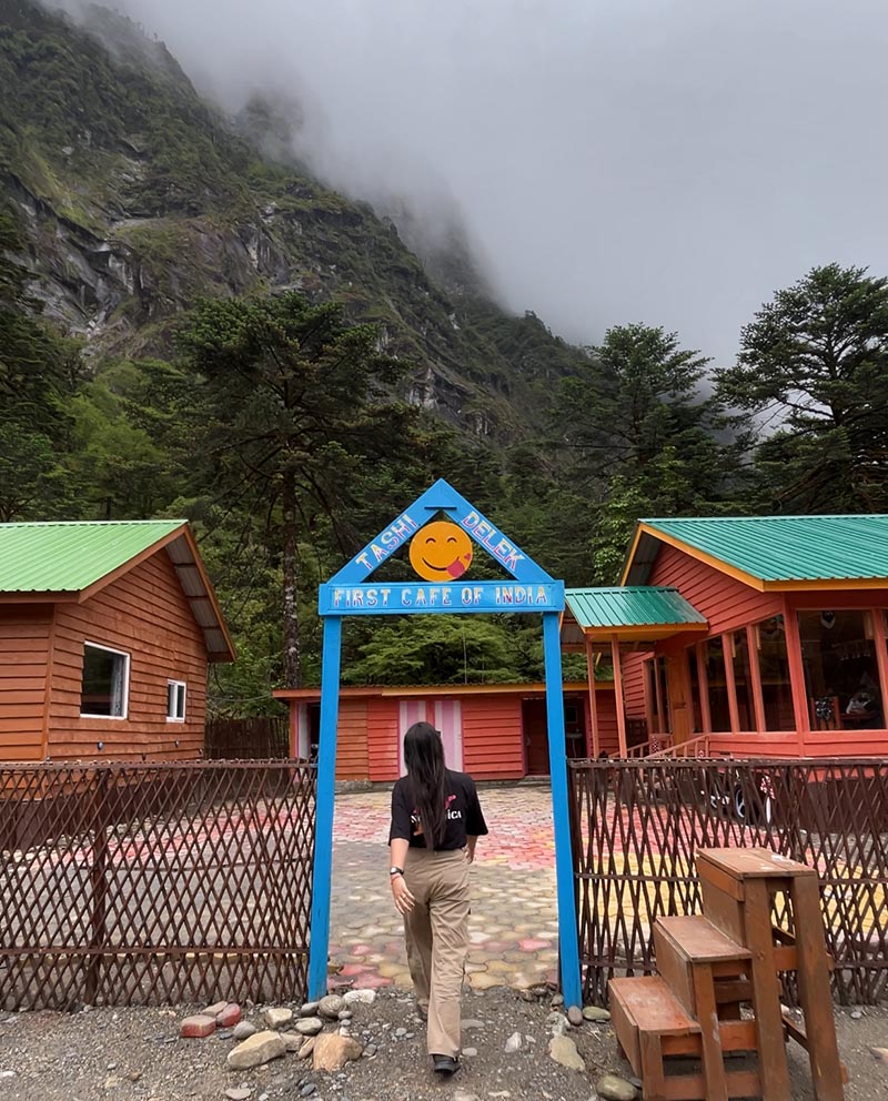 Entering First Cafe in India Lamang Pass Menchukha